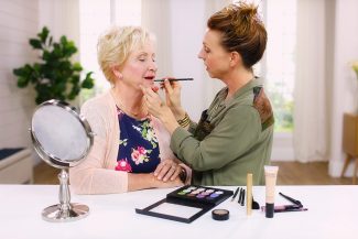Anna K showing Marcy how to do makeup