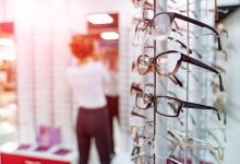 Woman choosing eyewear in a store