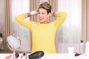 Woman styling short hair